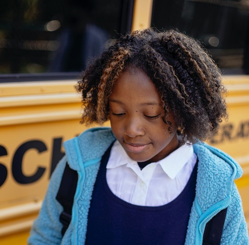 Child getting off school bus