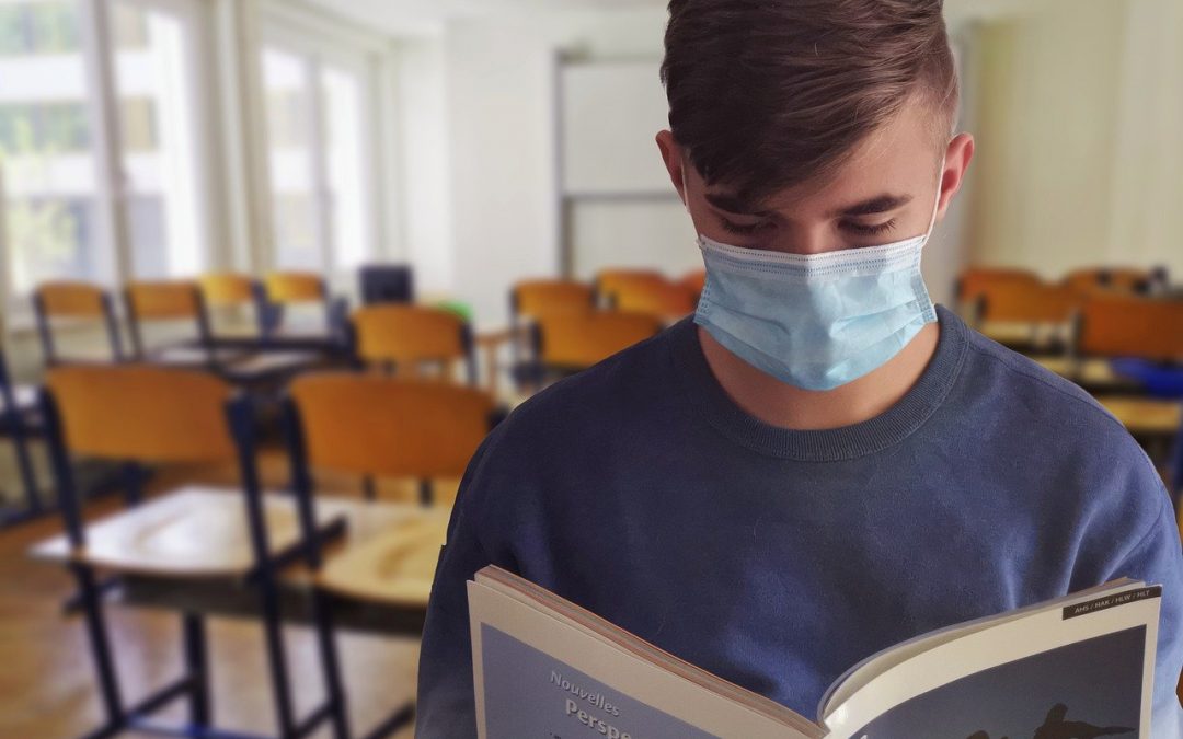 Student going back to school with a mask on